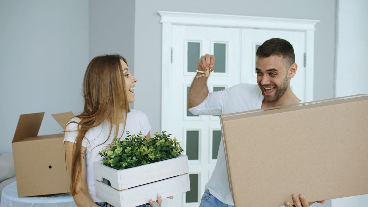 Happy couple enjoying their rental home and peace of mind